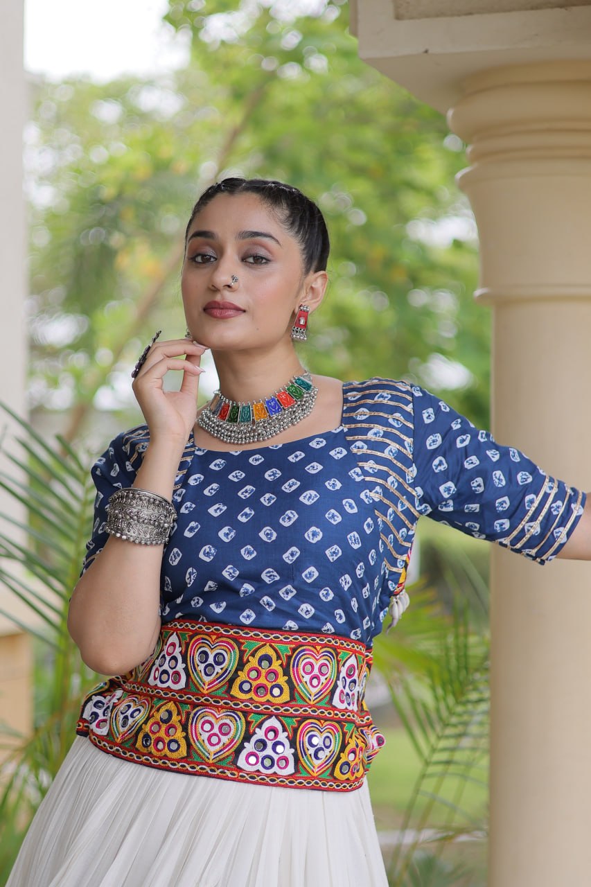 Navratri Off-White Kora Cotton Flared Lehenga Set with Gota Patti Lace Work & Indigo Blue Bandhani Embroidered Blouse