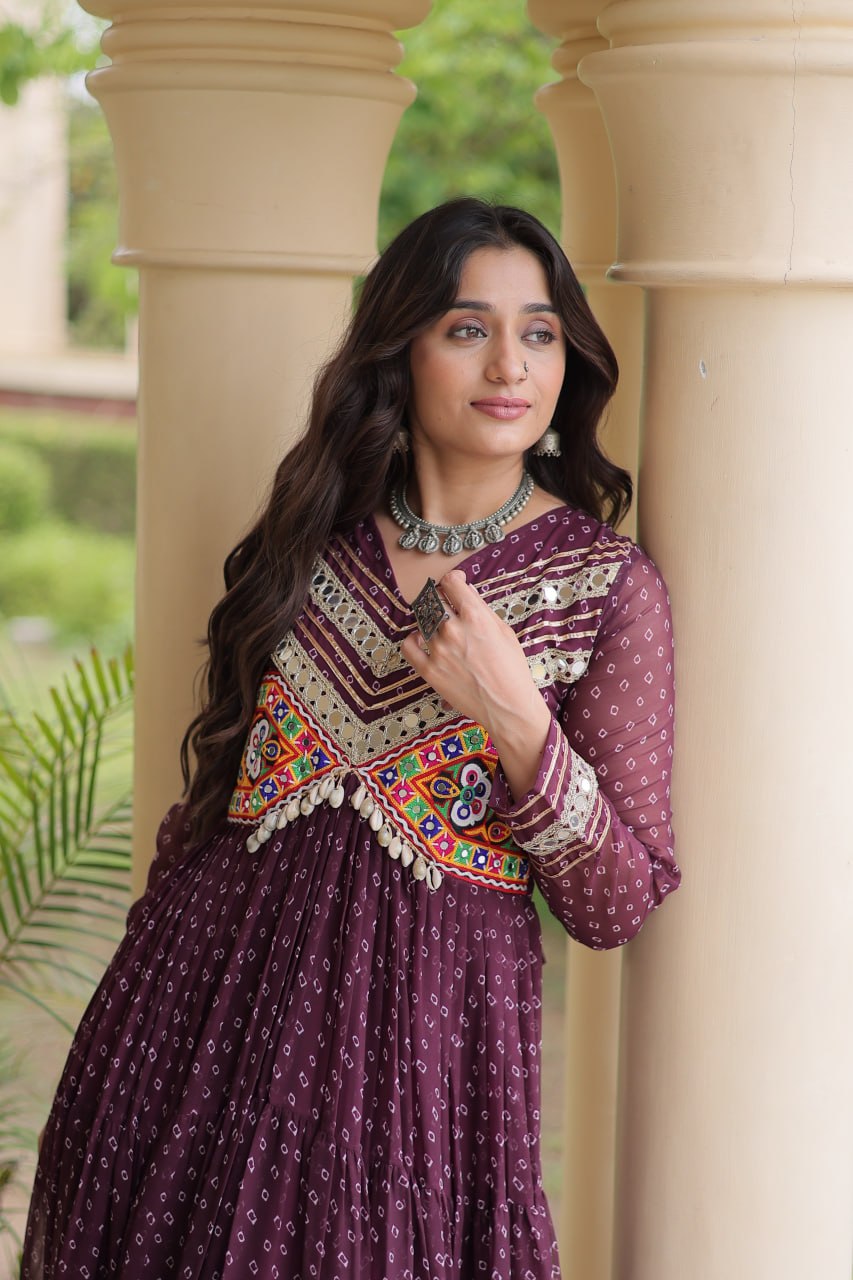 Deep Plum Faux Georgette Bandhani Print Navratri Gown with Kutchi Patchwork & Cowrie Shells