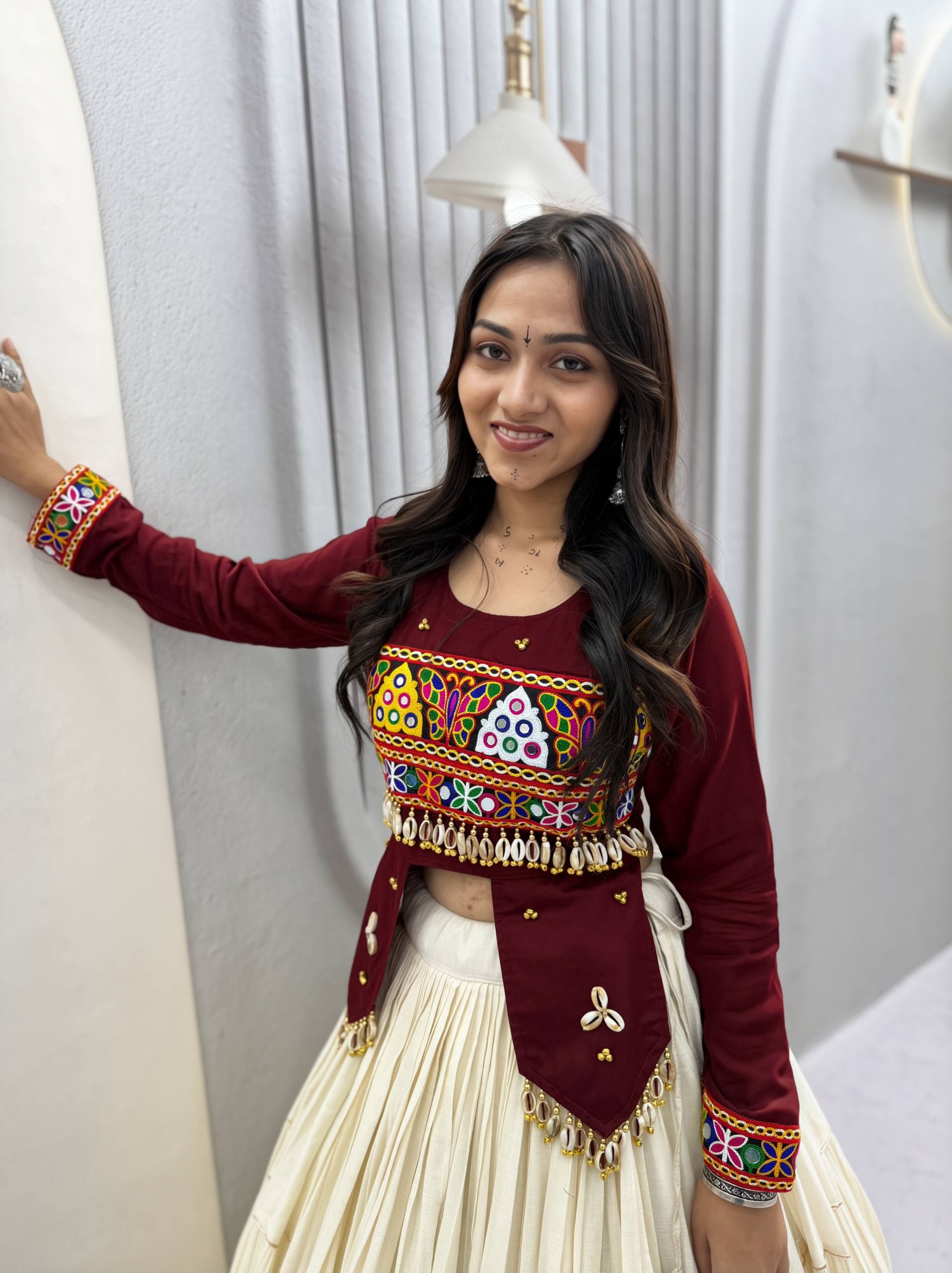 Navratri Off-White Multi-Tiered Flared Lehenga with Maroon Wine Kediya Jacket Blouse, Real Kodi & Kutchi Gamthi Hand Work
