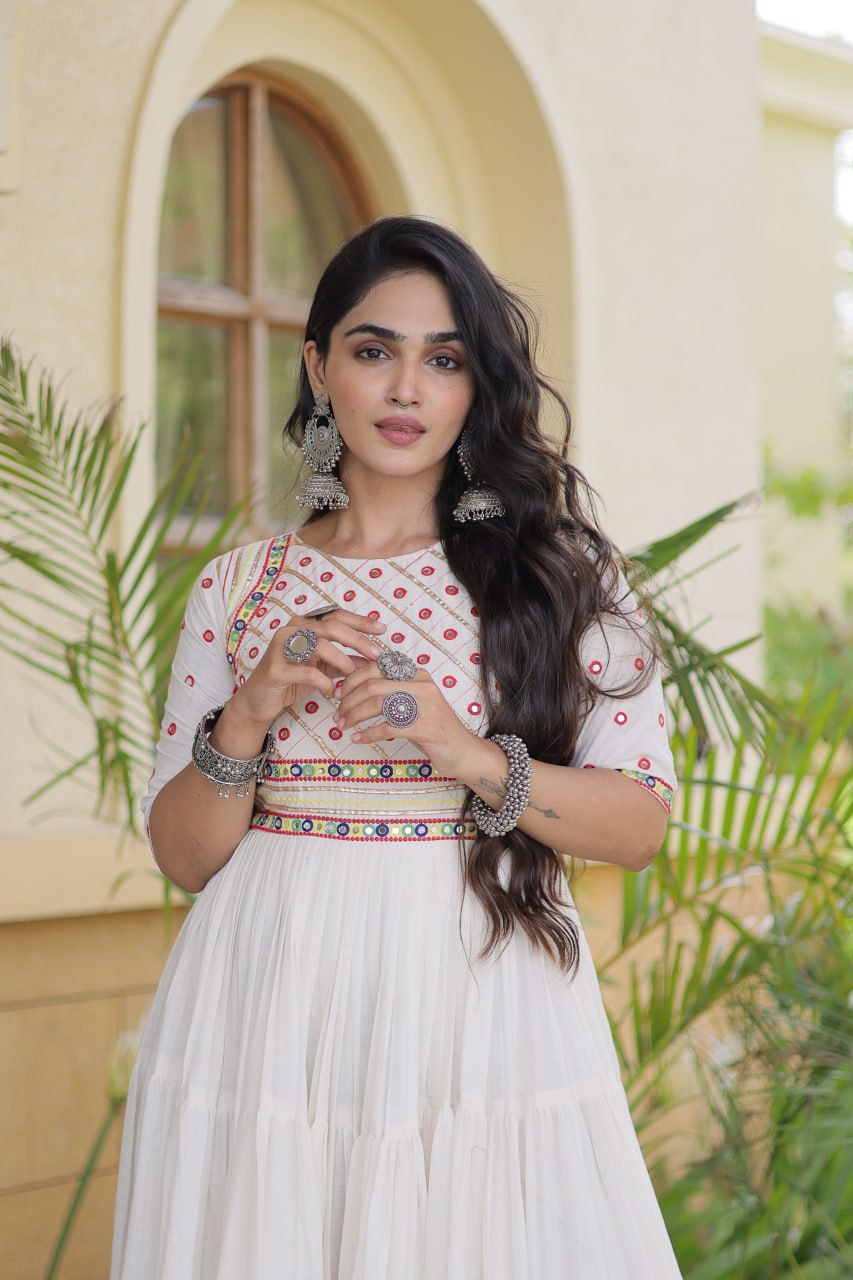 Navratri Off-White Kora Cotton Tiered Flared Anarkali Gown with Multi-Thread Geometric Embroidery, Gota Patti & Mirror Work