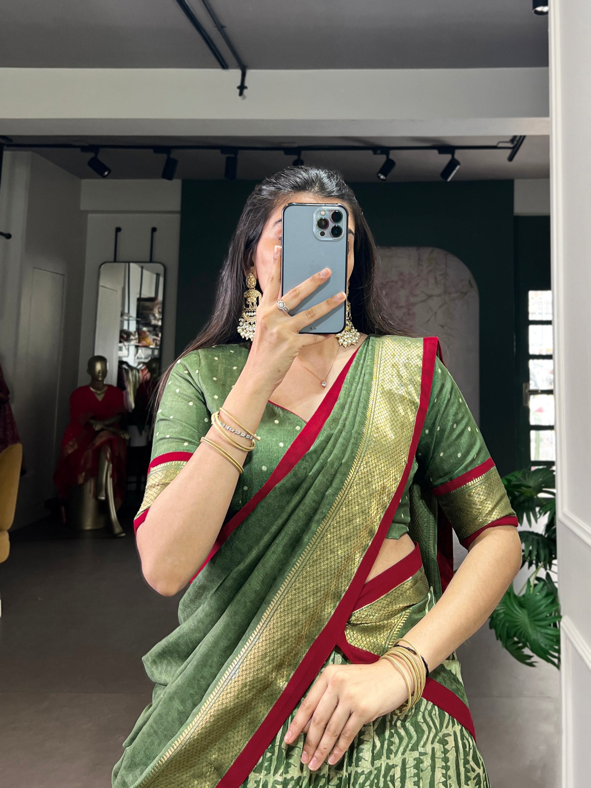 Olive Green Dola Silk Flared Lehenga Choli Set with Traditional Batik Print, Rich Zari Weaving Border & Maroon Accent Dupatta