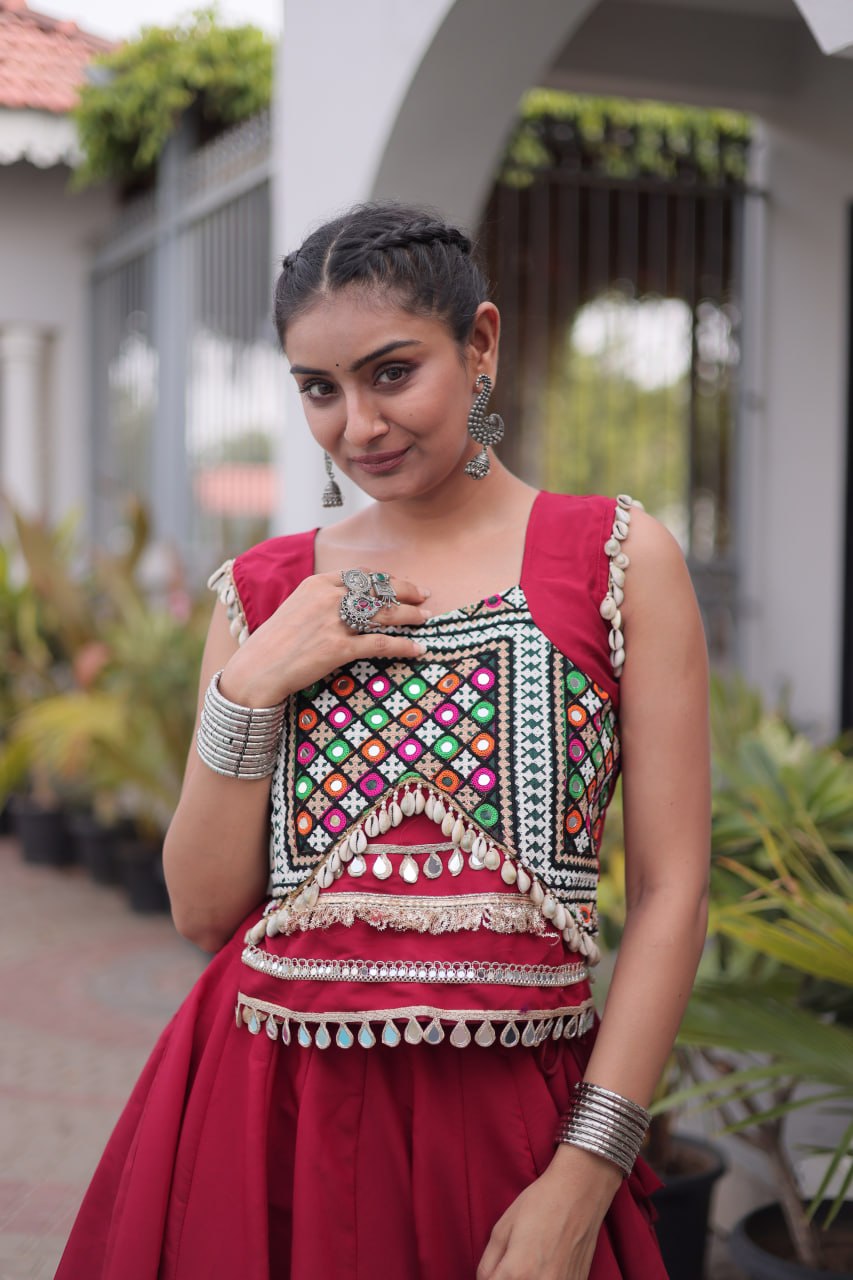 Navratri Maroon Red Roman Silk Flared Lehenga Choli Set with Pan-Patti Gota Pattern Work & Embroidered Mirror Work Blouse