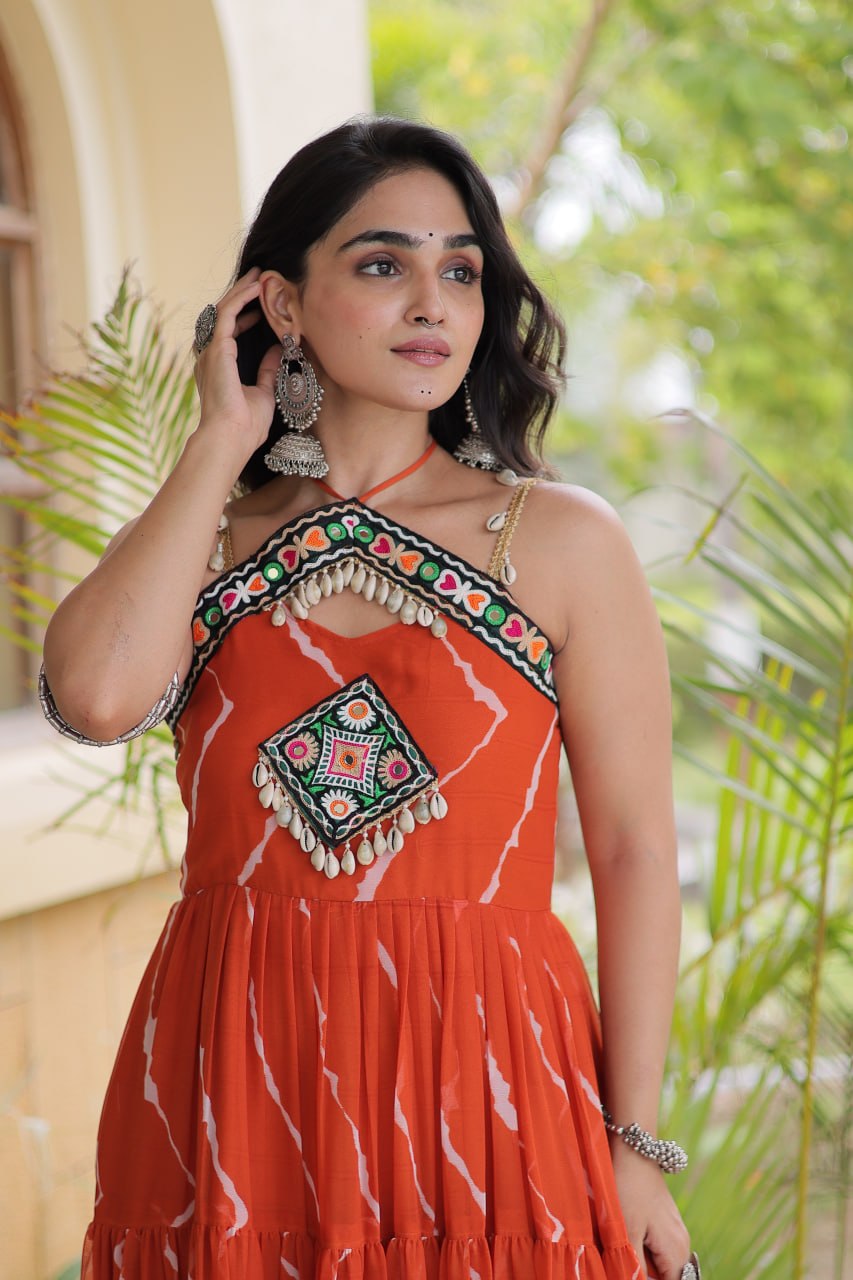 Rust Orange Faux Georgette Leheriya Print Gown with Kutchi Patchwork & Cowrie Shells