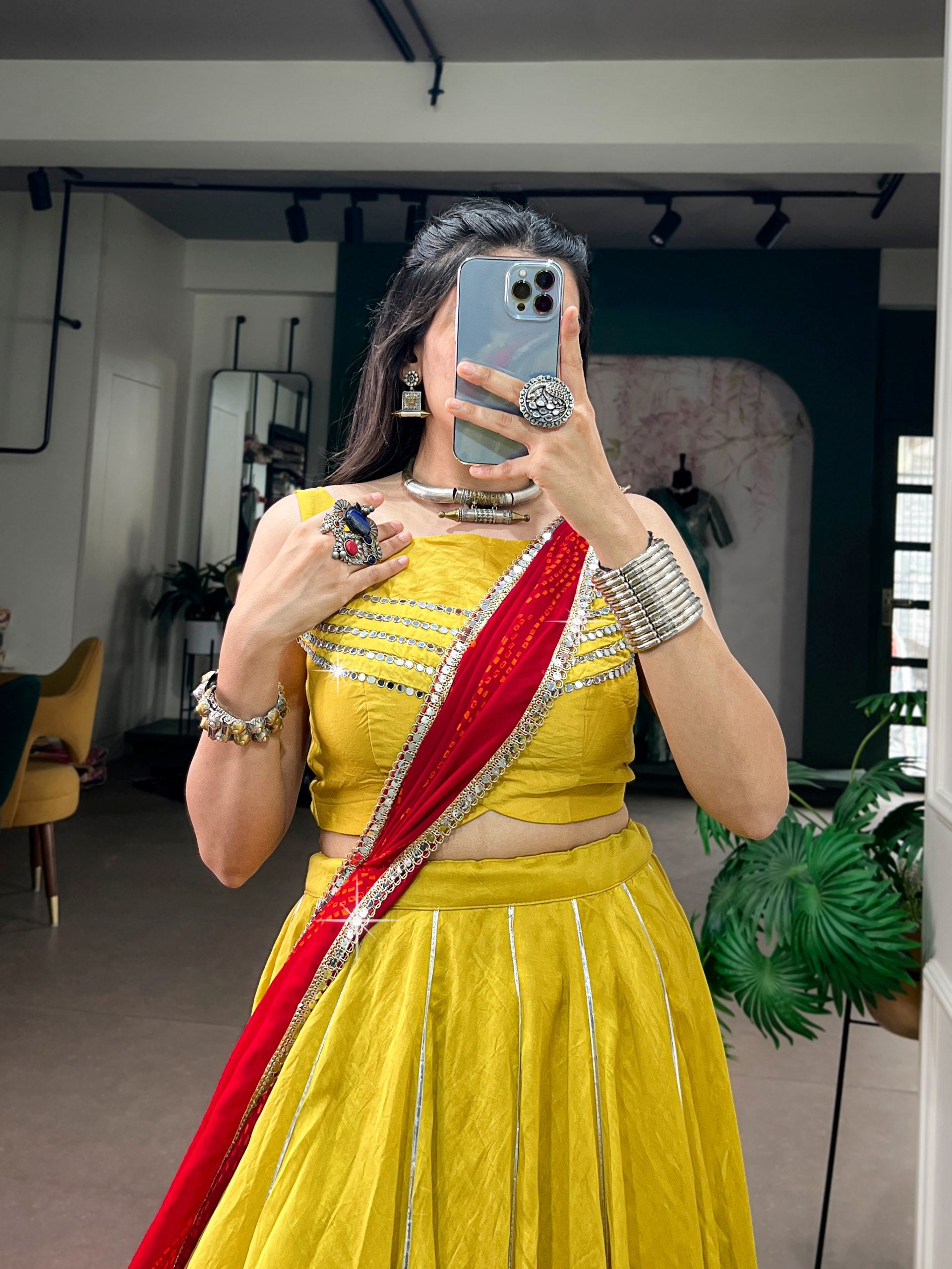 Mustard Yellow Chanderi Silk Flared Navratri Lehenga Choli Set with Traditional Mirror Gamthi Patches, Gota Patti & Red Bandhej Dupatta