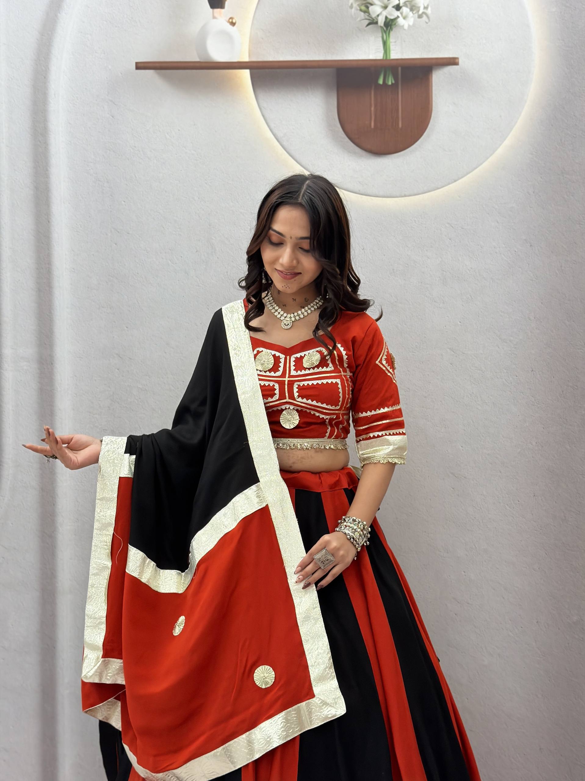 Navratri Rust Red & Jet Black Dual-Tone Flared Kalidar Lehenga Choli Set with Heavy Gota Patti Chevron Work, Handcrafted Mirror Blouse & Contrast Dupatta
