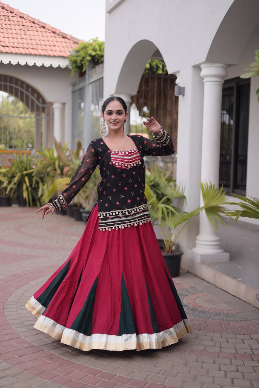 Navratri Rani Pink & Bottle Green 14kg Rayon Kali Flared Lehenga Choli Set with Black Printed Top & 2 Ton Lampi Lace