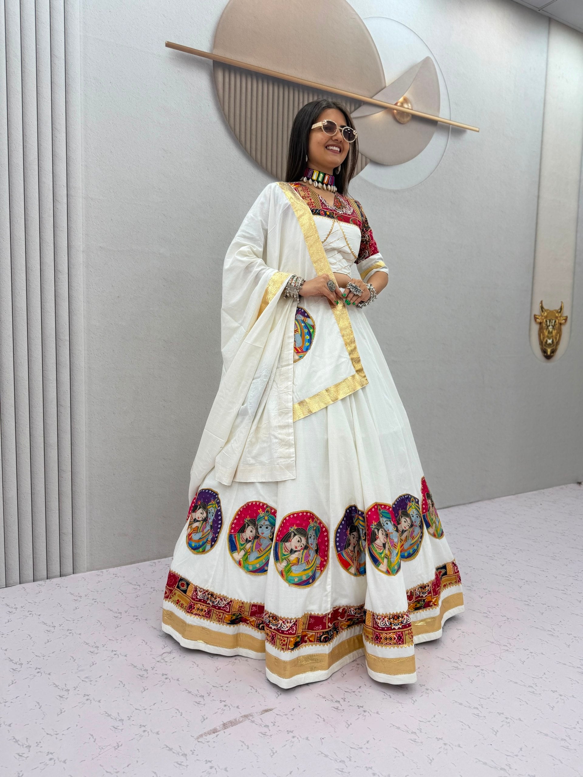 Navratri Special Pristine White Pure Cotton 6-Meter Flared Lehenga Choli Set with Radha Krishna Patchwork, Gota Patti & Colorful Gamthi Embroidered Blouse