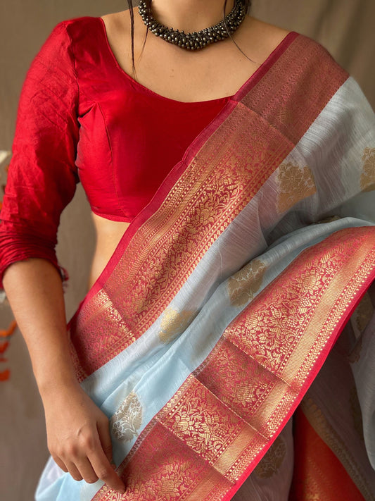 Sky Blue Soft Linen Weaving Sarees With Contrast Weaving Border And Pallu. Paired With Contrast Unstitched Blouse