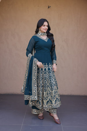Model Wearing Teal Blue Faux Blooming Georgette Embroidered Multi-Sequins Work Full Sleeves Gown Set By The Beauty Queen