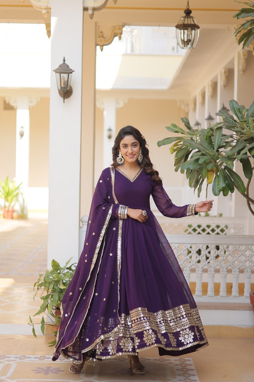 Wine Colour Faux Blooming Gown With Dupatta With Attractive Embroidered Sequins Work