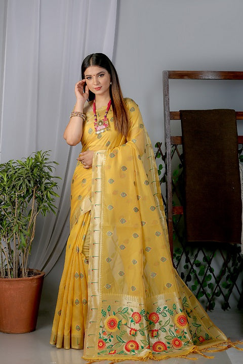 Yellow Paithani Saree In Organza Smooth Fabric With Rich Weaving And Cotton Tassles On Pallu