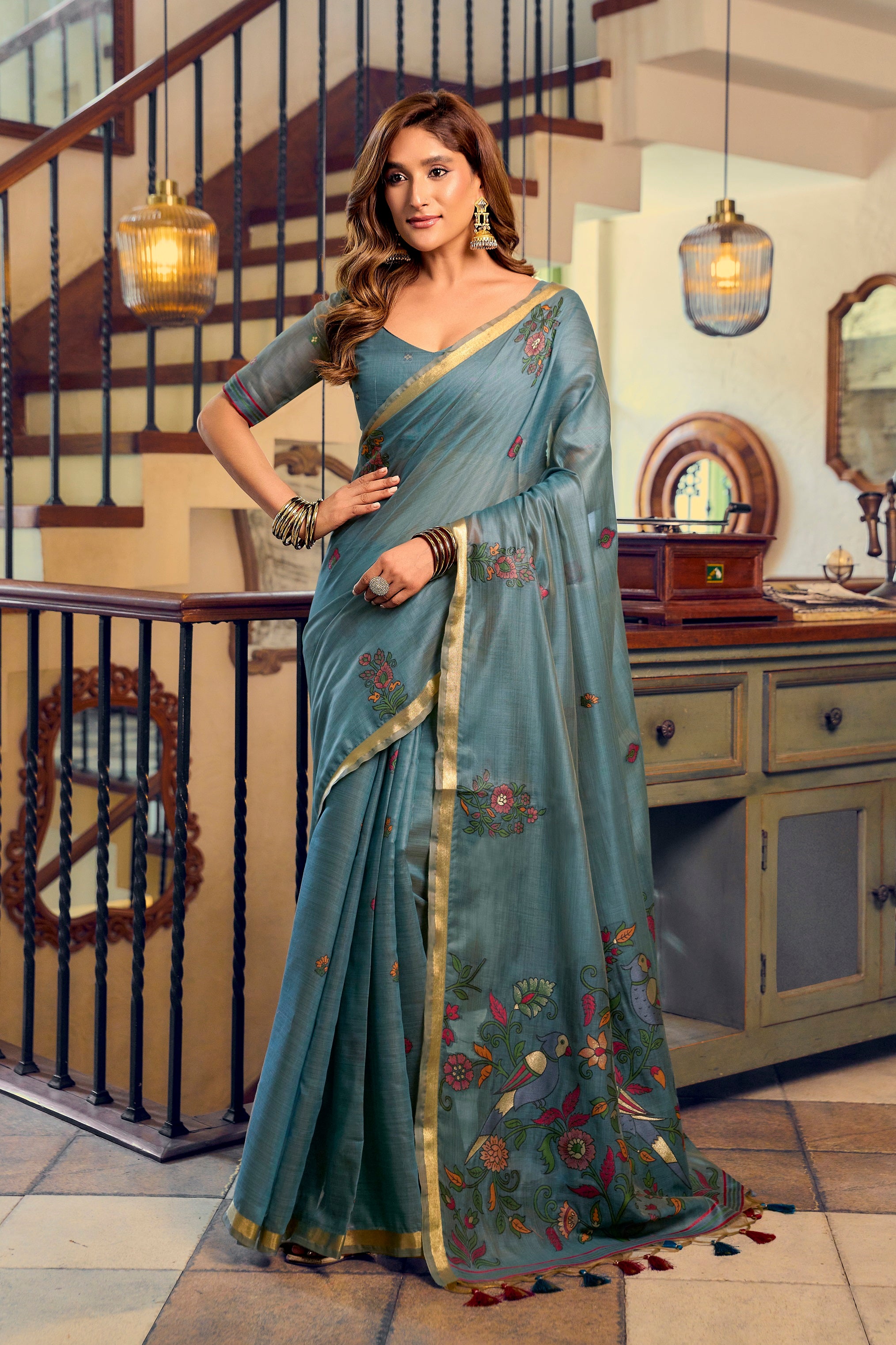 Steel Blue Kolkata Cotton Saree with colorful litchi work motifs and fancy tassels by The Beauty Queen Surat.
