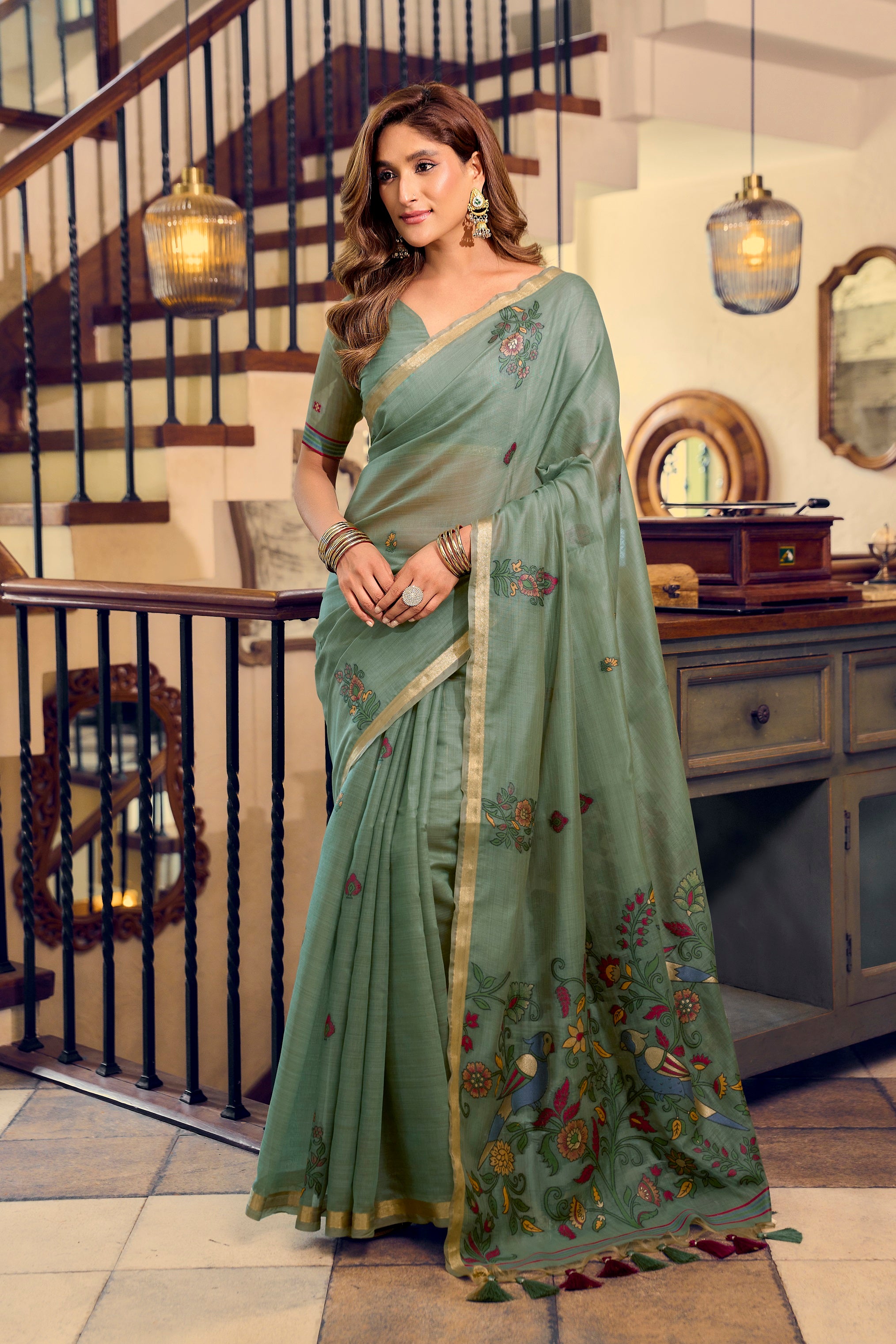 Pista Green Kolkata Cotton Saree featuring colorful floral litchi work and designer tassels by The Beauty Queen Surat.