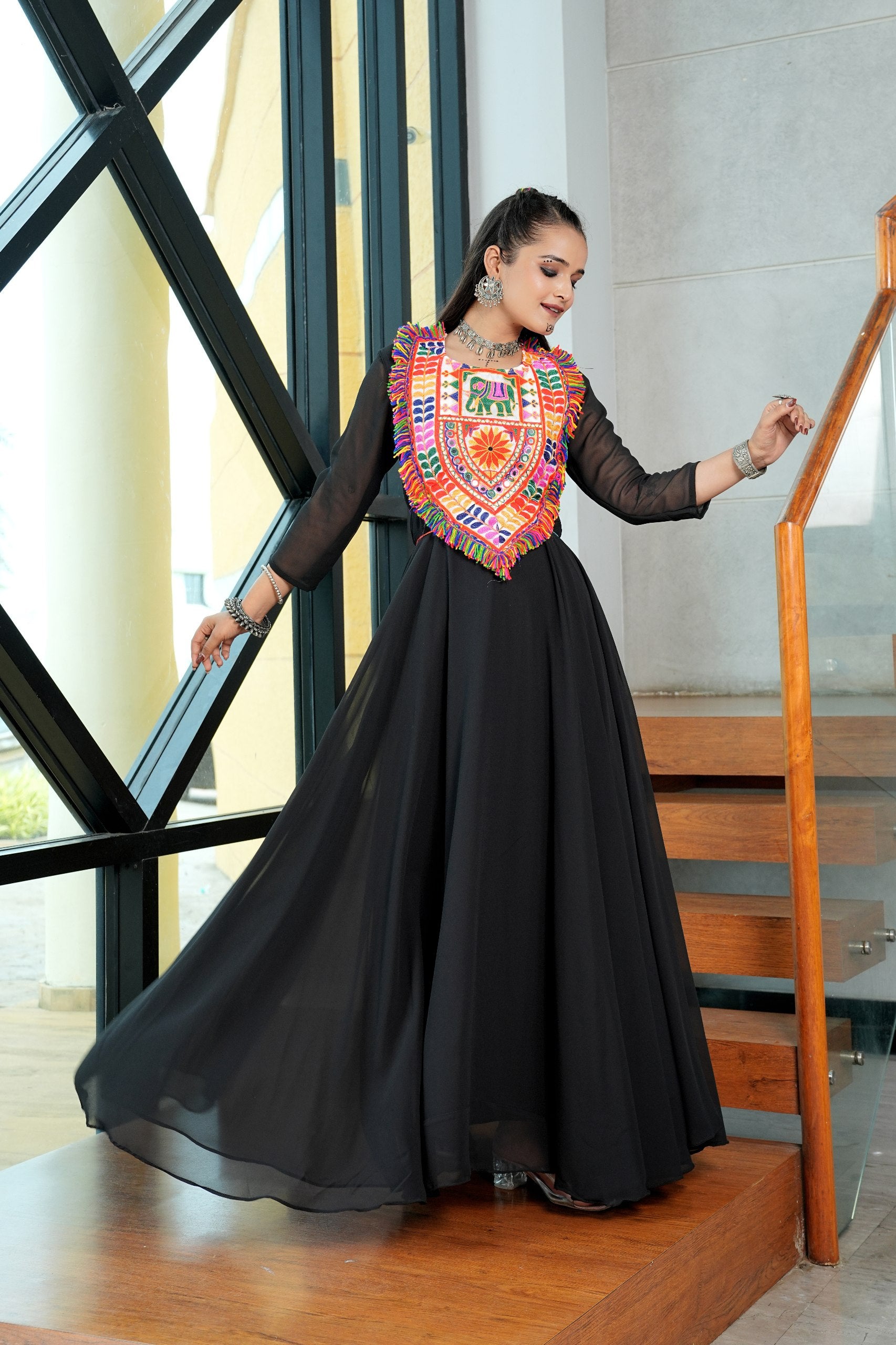 Black georgette Navratri gown with multicolor Kutchi embroidery and mirror work