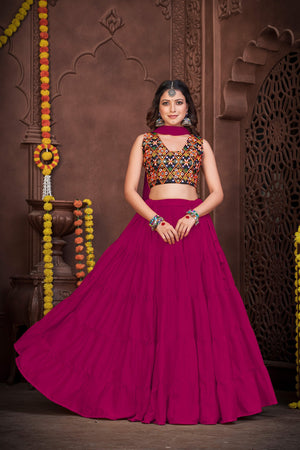 Pink French Crape Navratri Lehenga Choli with multi-color Kutchi embroidery and mirror work blouse by The Beauty Queen