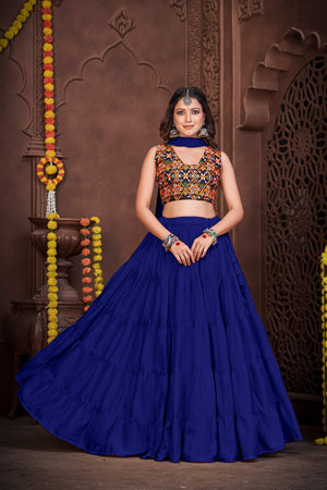 Royal Blue French Crape Navratri Lehenga Choli with multi-color Kutchi embroidery and mirror work blouse by The Beauty Queen