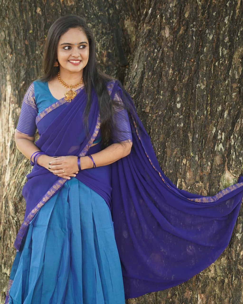 Firoza Blue Kanjivaram Silk Half Saree with Deep Purple Dupatta and Gold Zari Weaving Work by The Beauty Queen Surat