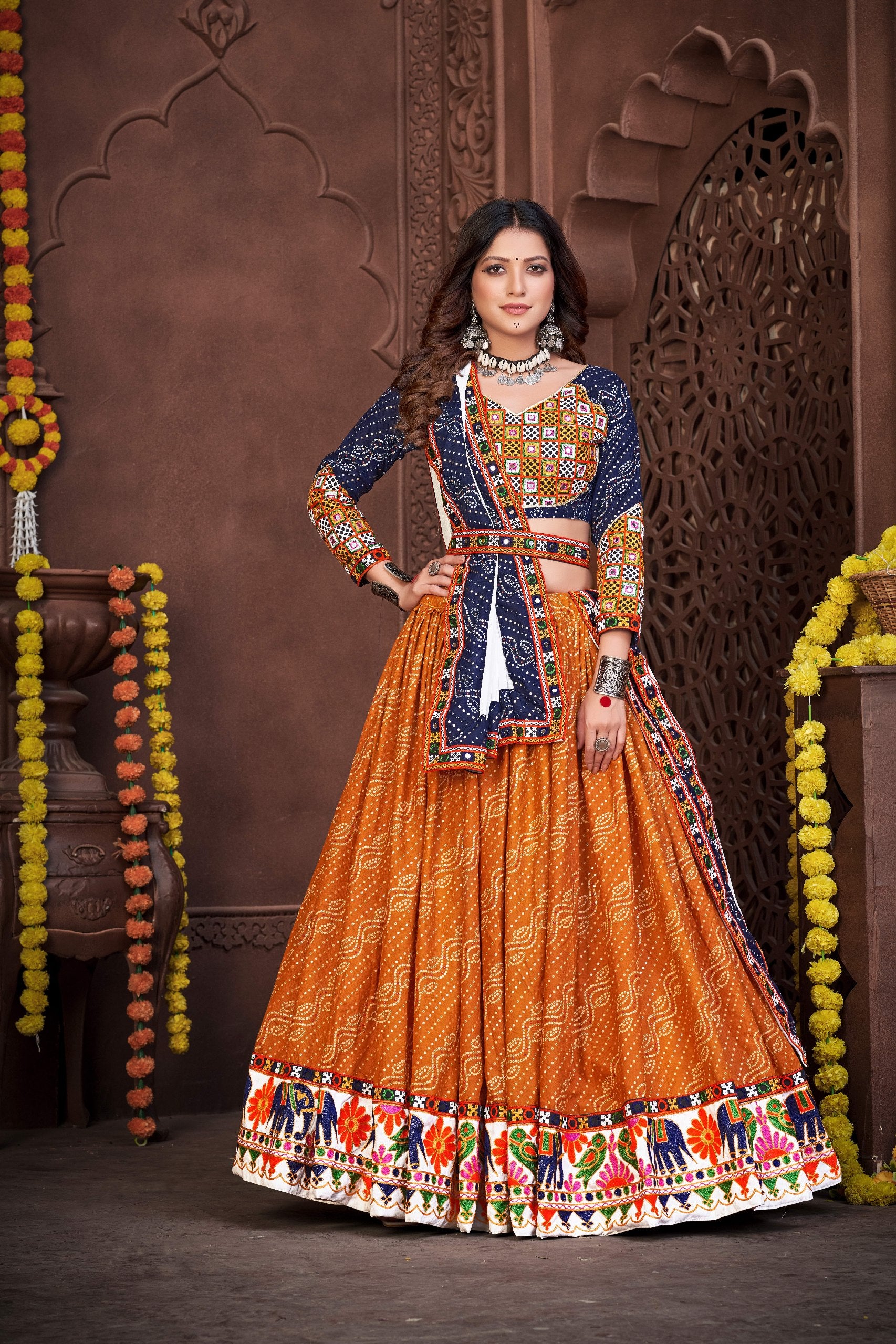 Mustard and Navy Blue Cotton Silk Navratri Lehenga Choli with Bandhani print, embroidery, and mirror work by The Beauty Queen
