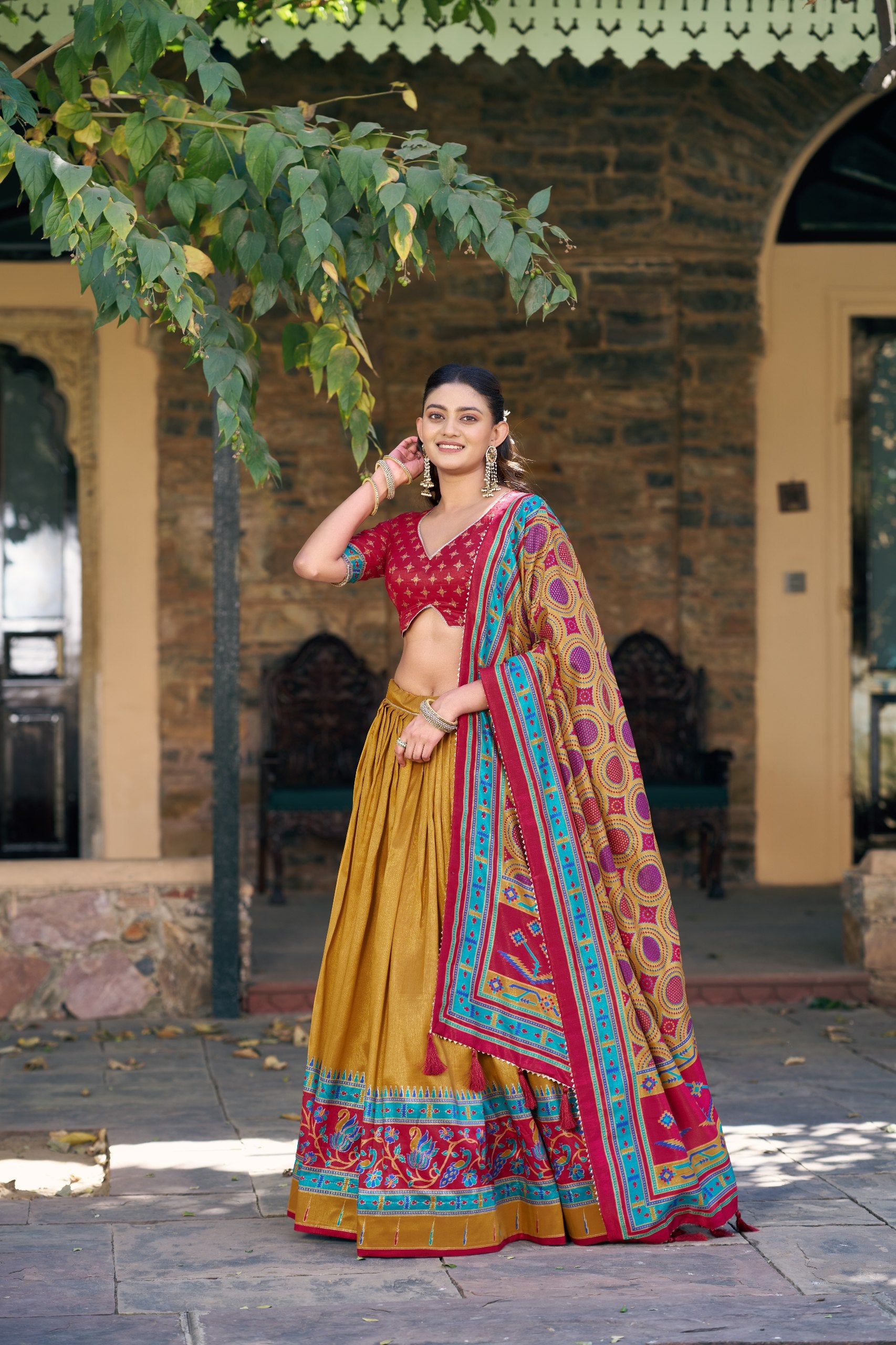 Mustard and Maroon Tasar Silk Navratri Lehenga Choli featuring iconic sparkle and peacock printed work by The Beauty Queen