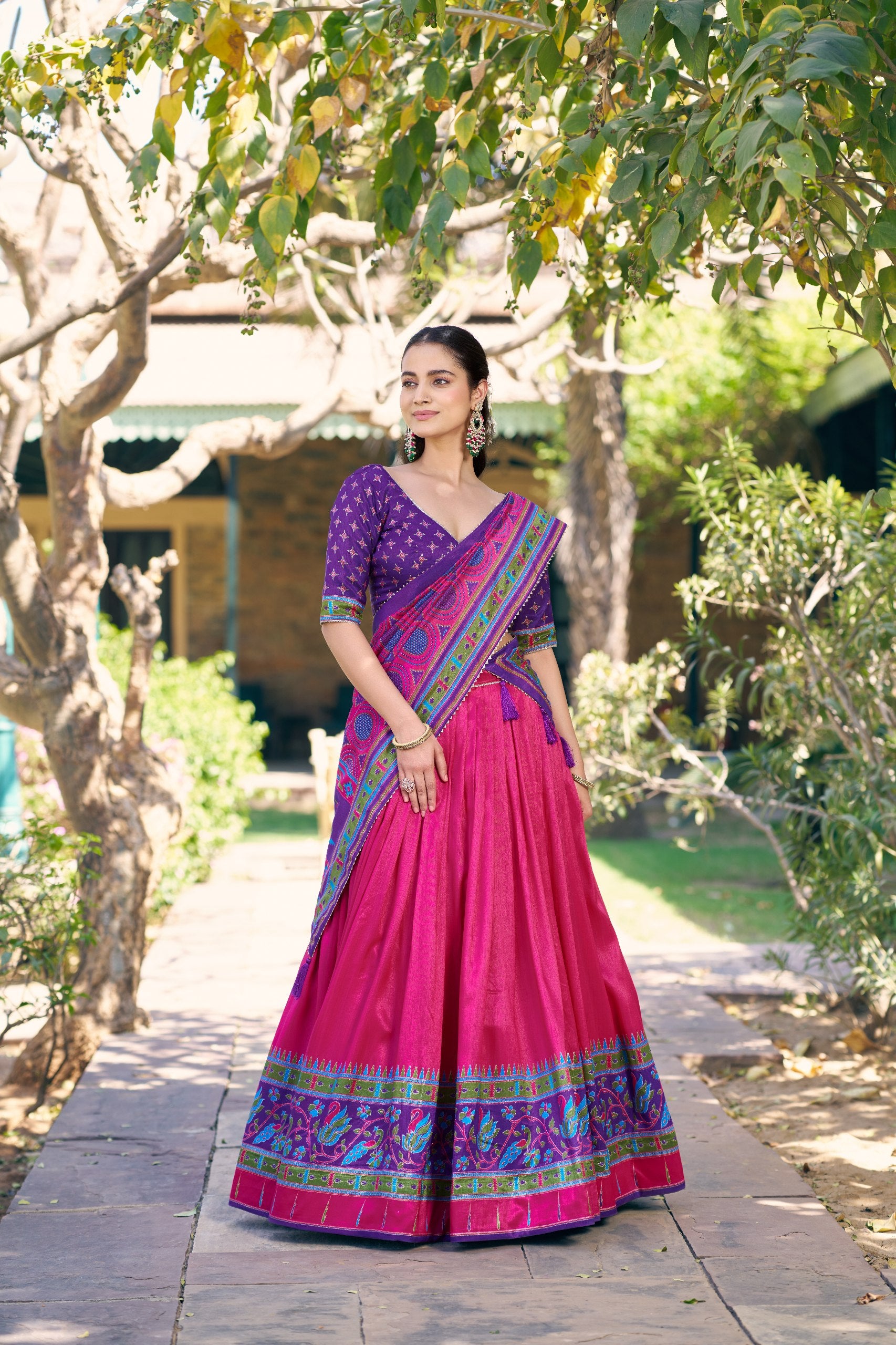 Pink and Purple Tasar Silk Navratri Lehenga Choli featuring iconic sparkle and peacock printed work by The Beauty Queen