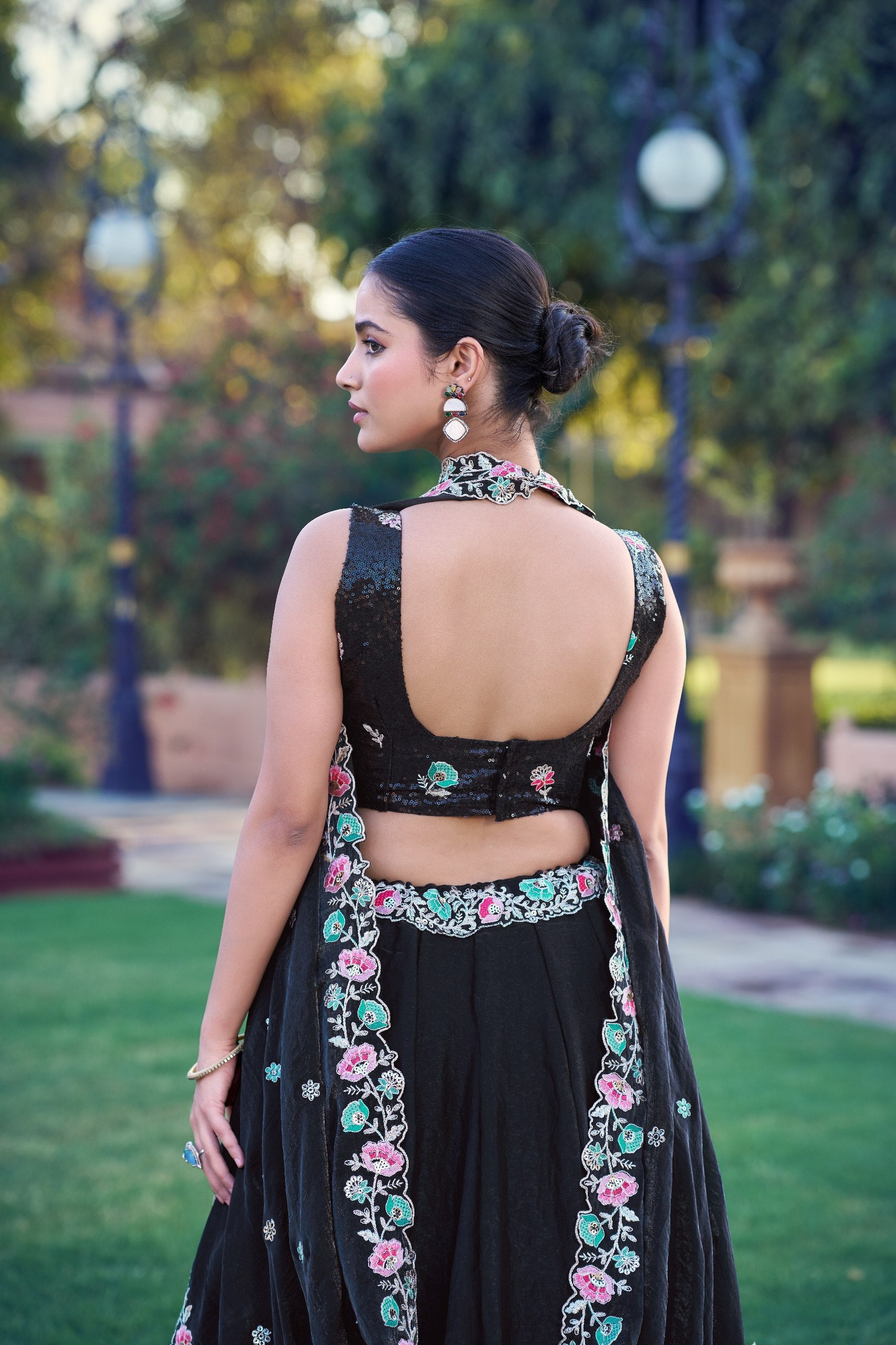 Black lehenga choli with embellished belt and dupatta
