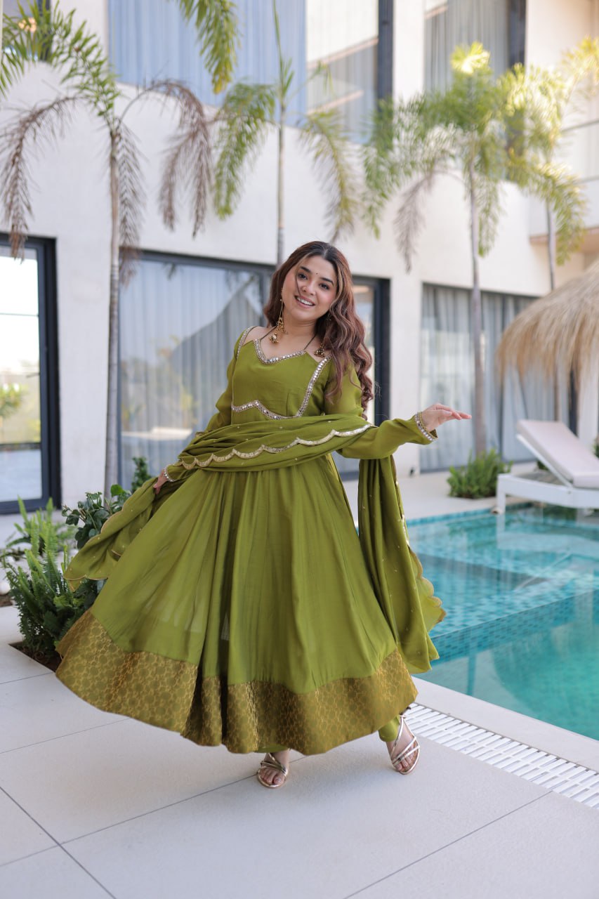 Sap Green Color Mul Chanderi With Rich Mirror Lace Work Suit