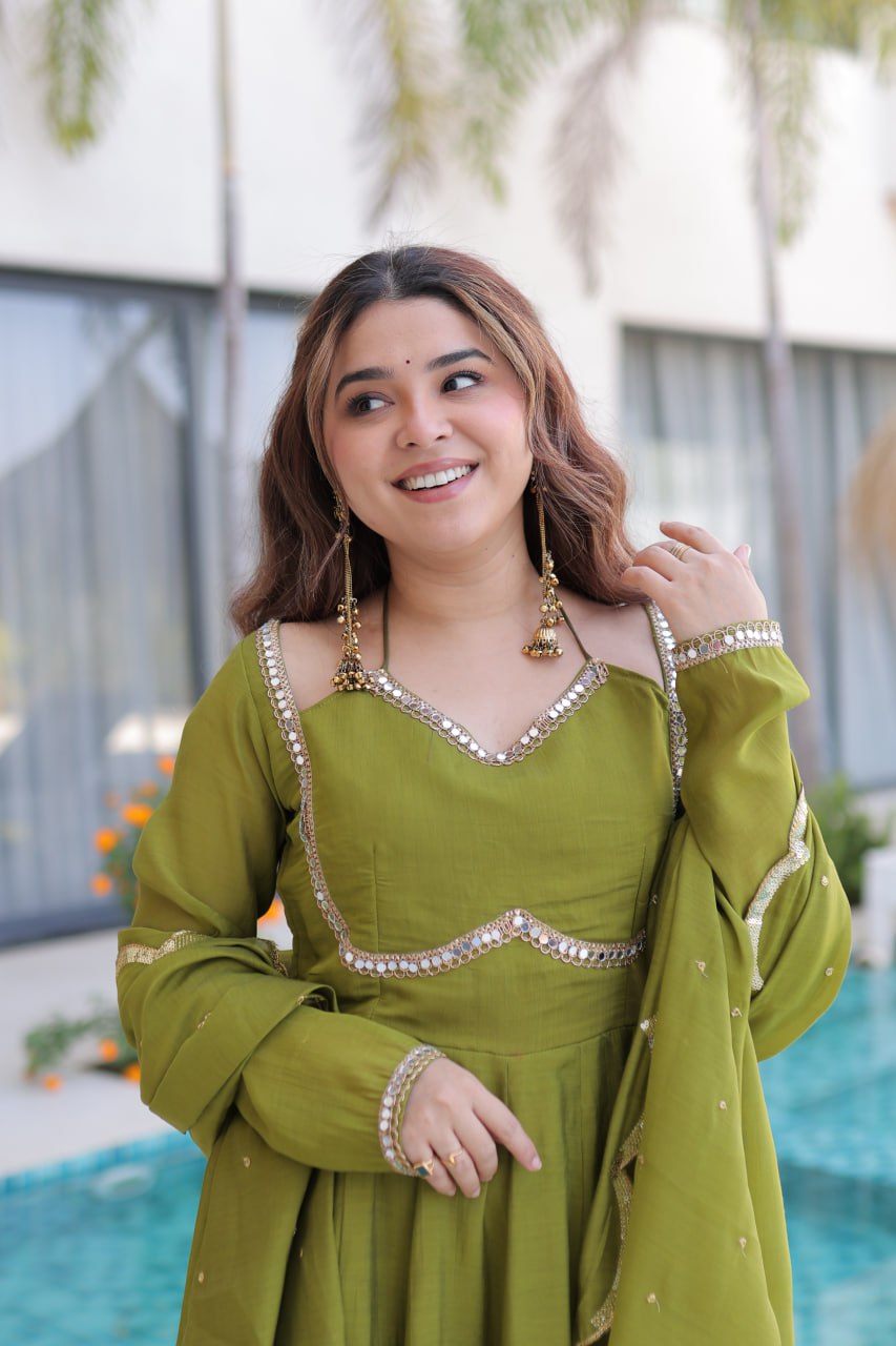 Sap Green Color Mul Chanderi With Rich Mirror Lace Work Suit