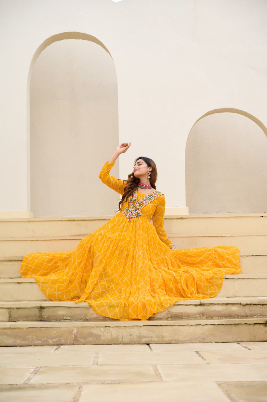Yellow Bandhani Print Work With Kutchi Patchework Navratri Gown