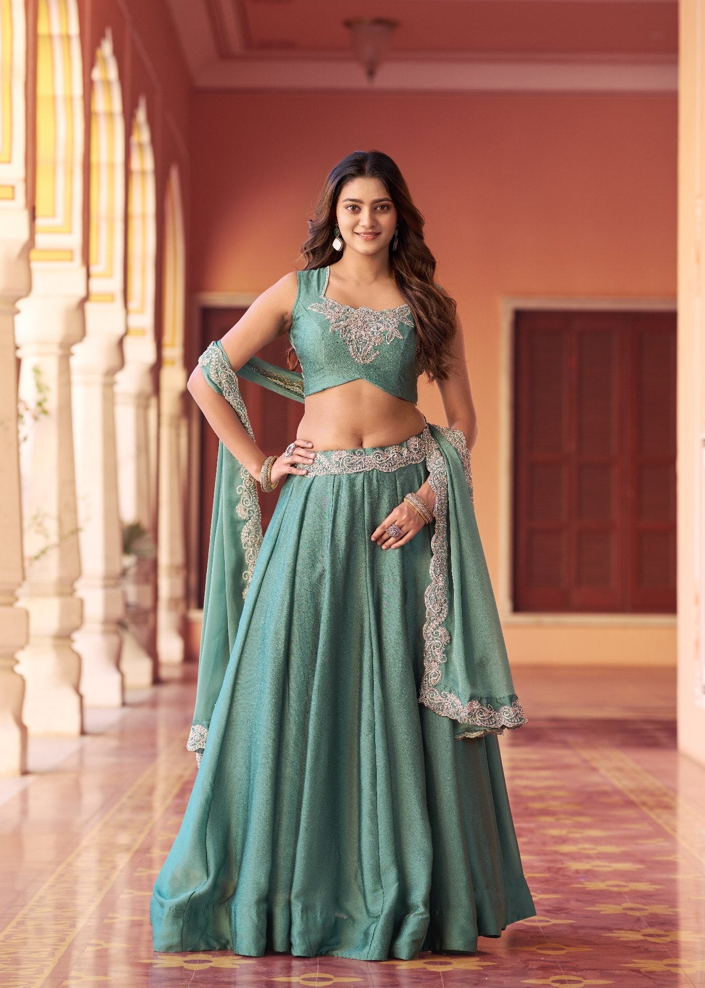 Sage green Rangoli silk lehenga choli with tube bead embroidery
