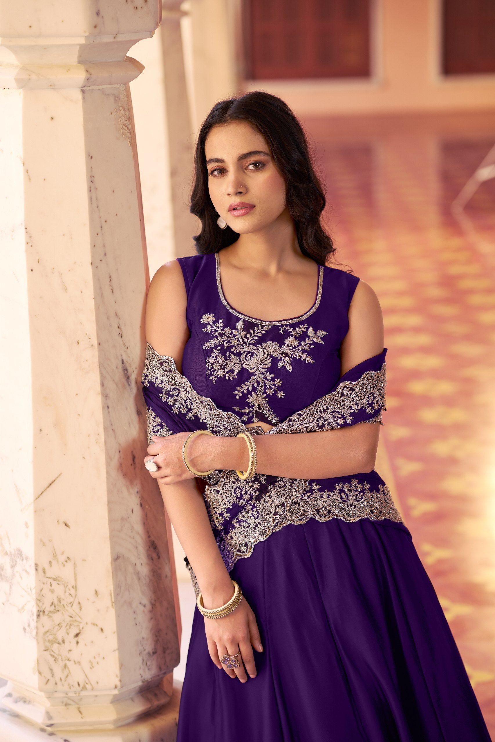 Purple designer lehenga with tube bead and sequins work
