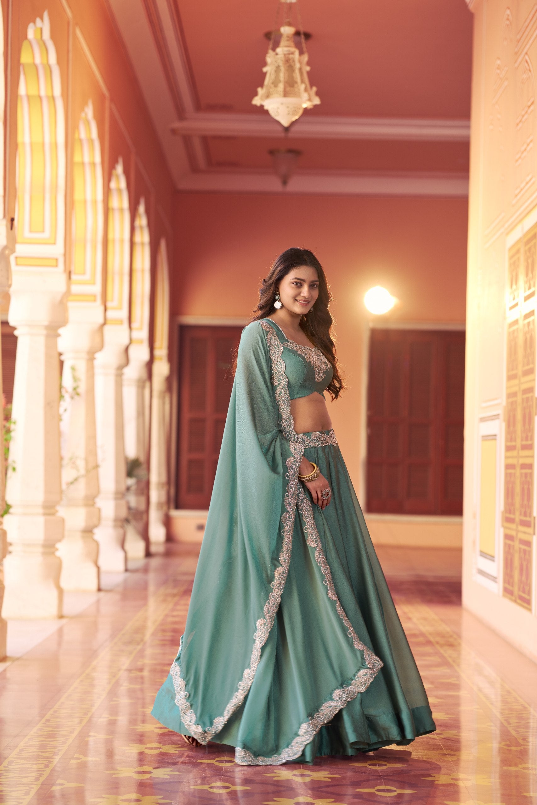 Designer engagement lehenga sage green sequins embroidery
