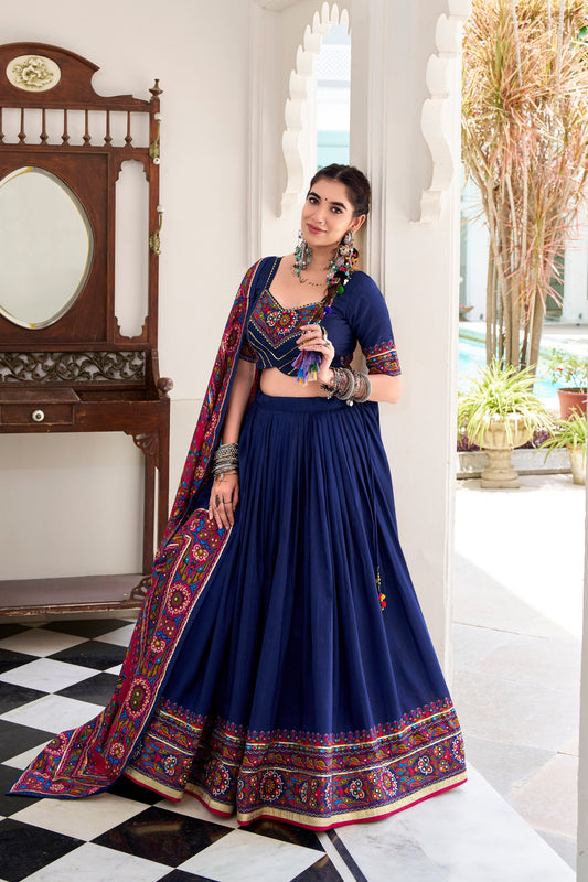 Navy Blue Tasar Silk Gamthi Print With Embossed Design Work Navratri Lehenga Choli