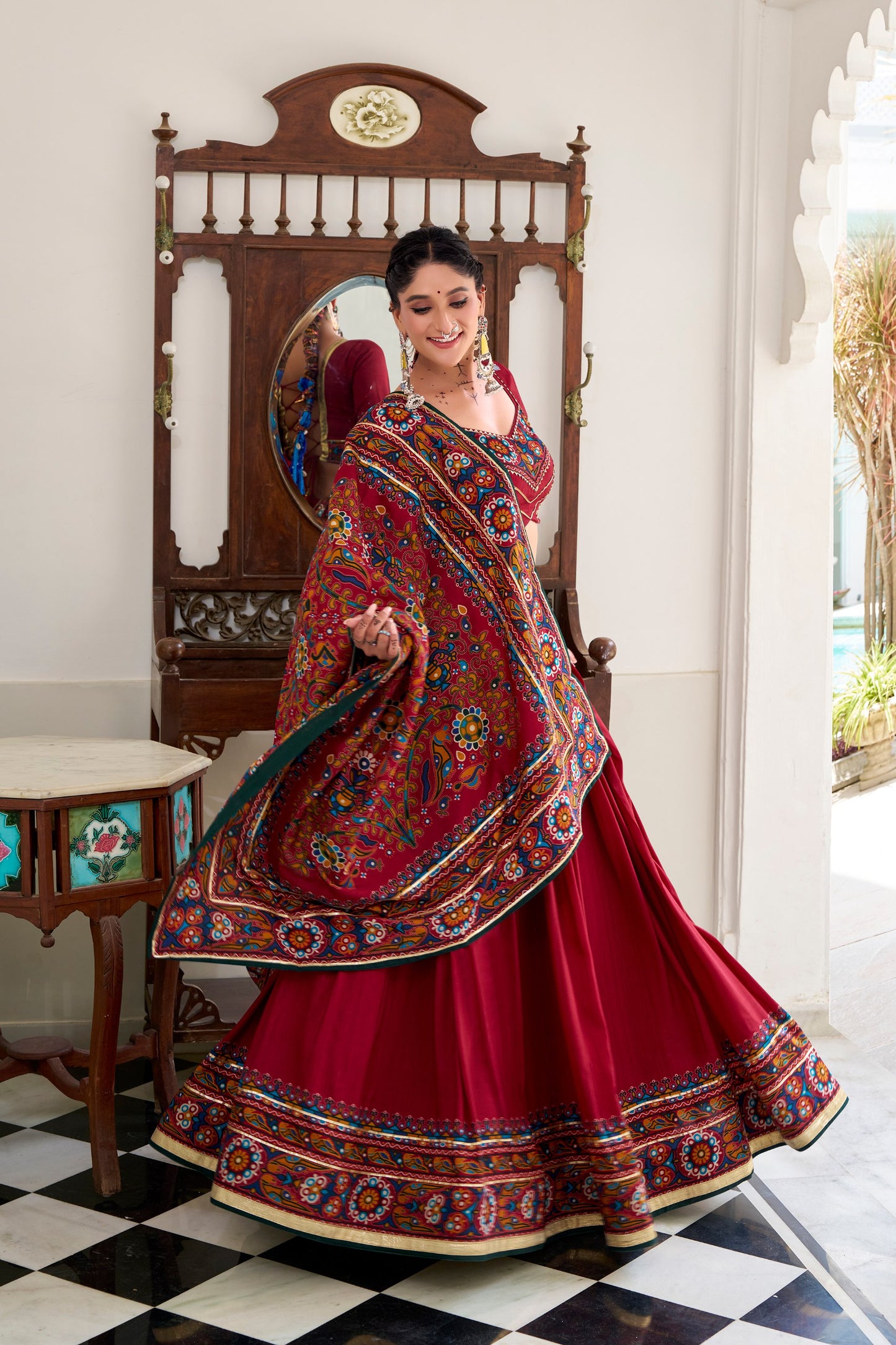 Red Tasar Silk Gamthi Print With Embossed Design Work Navratri Lehenga Choli