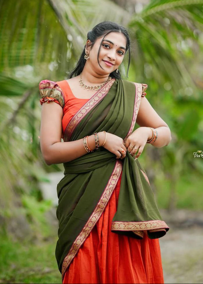 Orange Kanjivaram Silk Half Saree with Olive Green Dupatta and Gold Zari Weaving Work by The Beauty Queen Surat