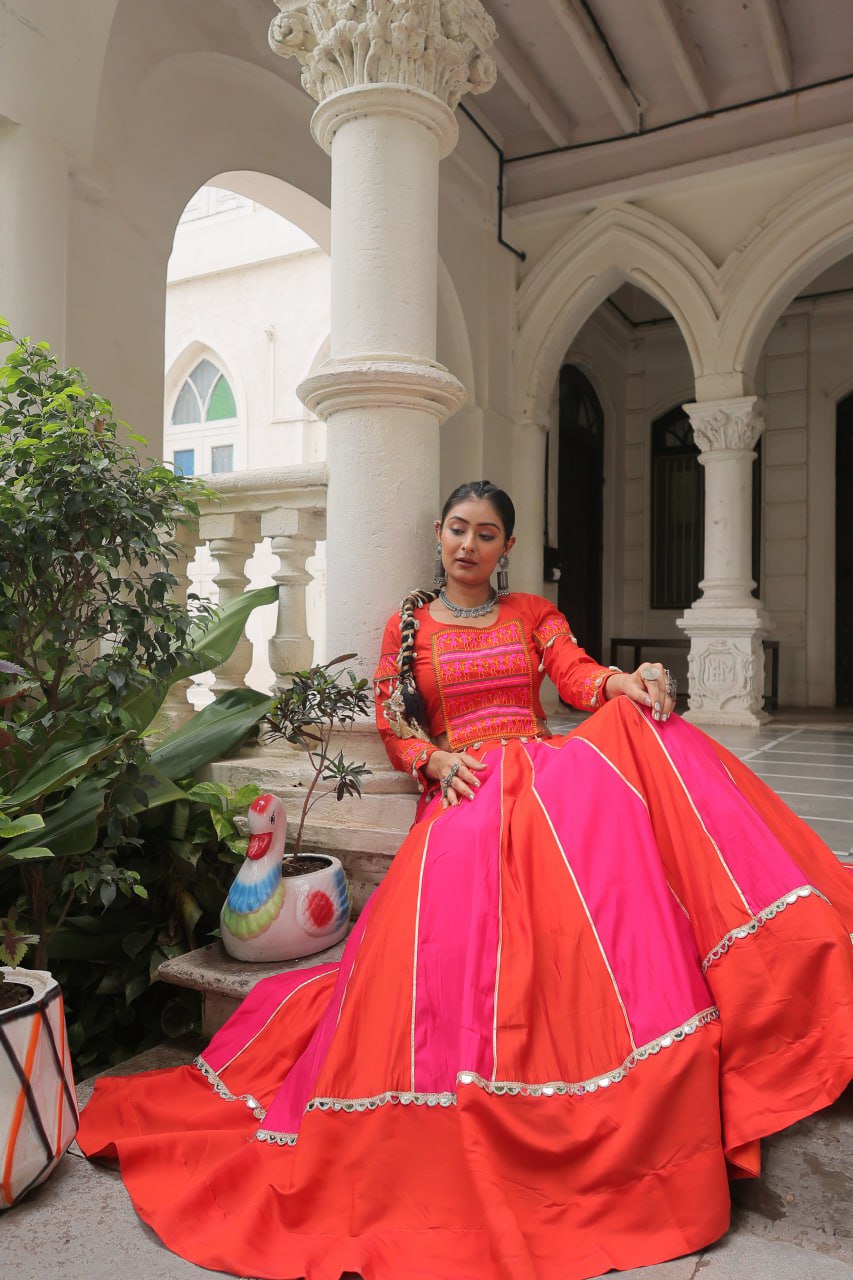 Orange Attractive Combination Of Mirror Lace Embellished Work Navratri Lehenga Choli