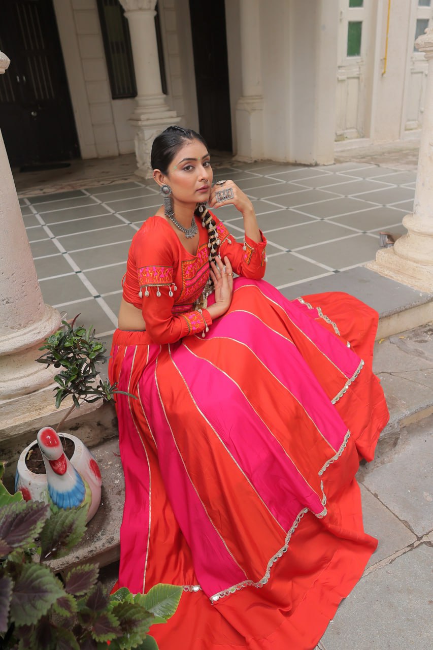 Orange Attractive Combination Of Mirror Lace Embellished Work Navratri Lehenga Choli
