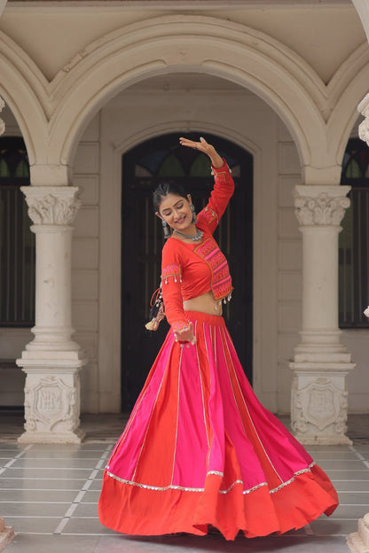Orange Attractive Combination Of Mirror Lace Embellished Work Navratri Lehenga Choli
