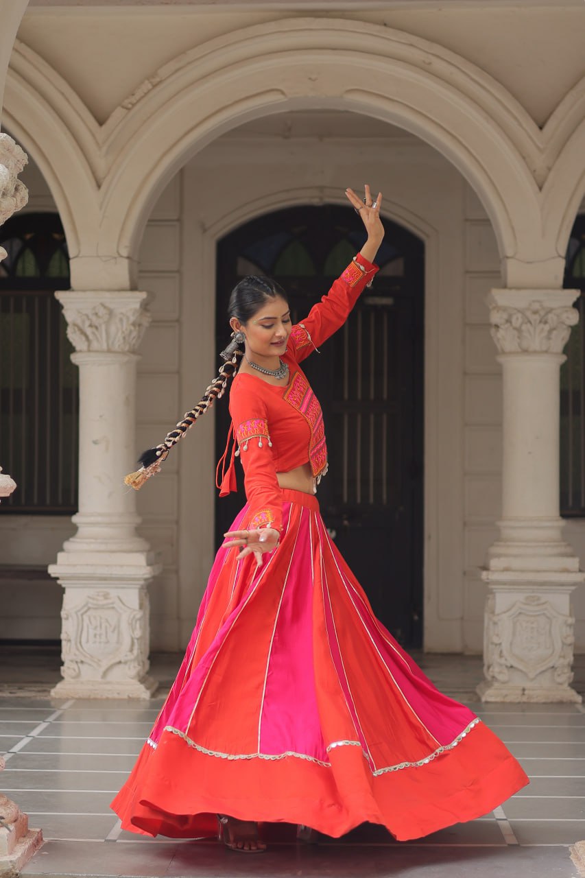 Orange Attractive Combination Of Mirror Lace Embellished Work Navratri Lehenga Choli