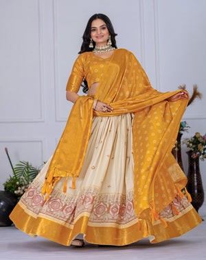 Yellow Lichi Silk Lehenga with Jacquard Border and Jari Lining Print by The Beauty Queen Surat