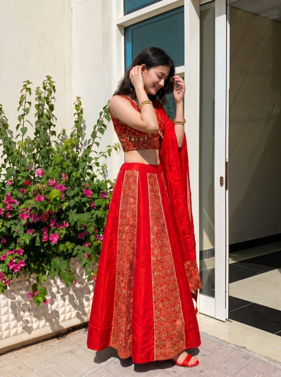 Red Navratri lehenga choli with stitched Ajrakh blouse
