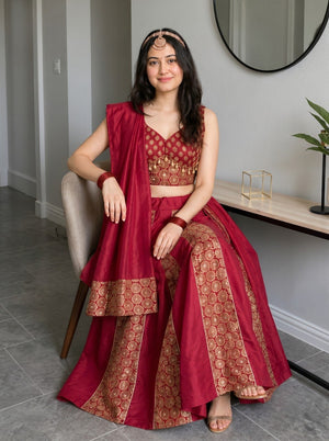 Stitched maroon Navratri lehenga with gold brocade panels
