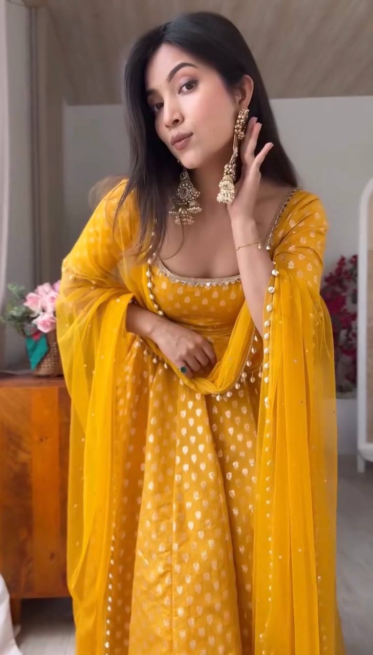 Designer yellow chanderi suit with woven gold butti
