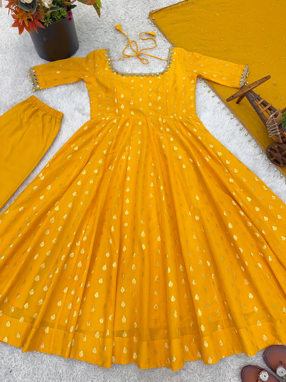 Full sleeve yellow Anarkali suit with jacquard weaving
