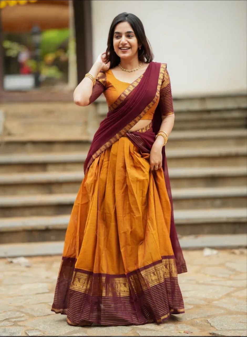 Mustard Yellow Kanjivaram Silk Half Saree with Maroon Dupatta and Gold Zari Weaving Work by The Beauty Queen Surat