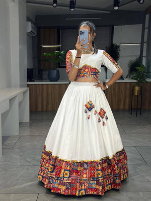 Traditional white chaniya choli with foil and gota patti trim
