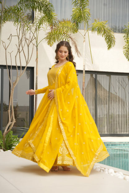 Yellow Faux Blooming With Embroidery Zari Sequins Work Gown