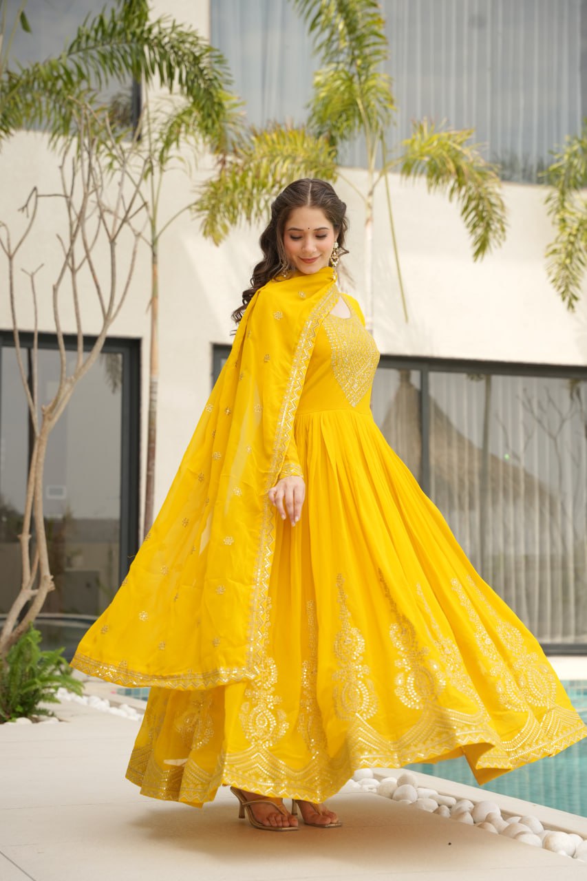 Yellow Faux Blooming With Embroidery Zari Sequins Work Gown