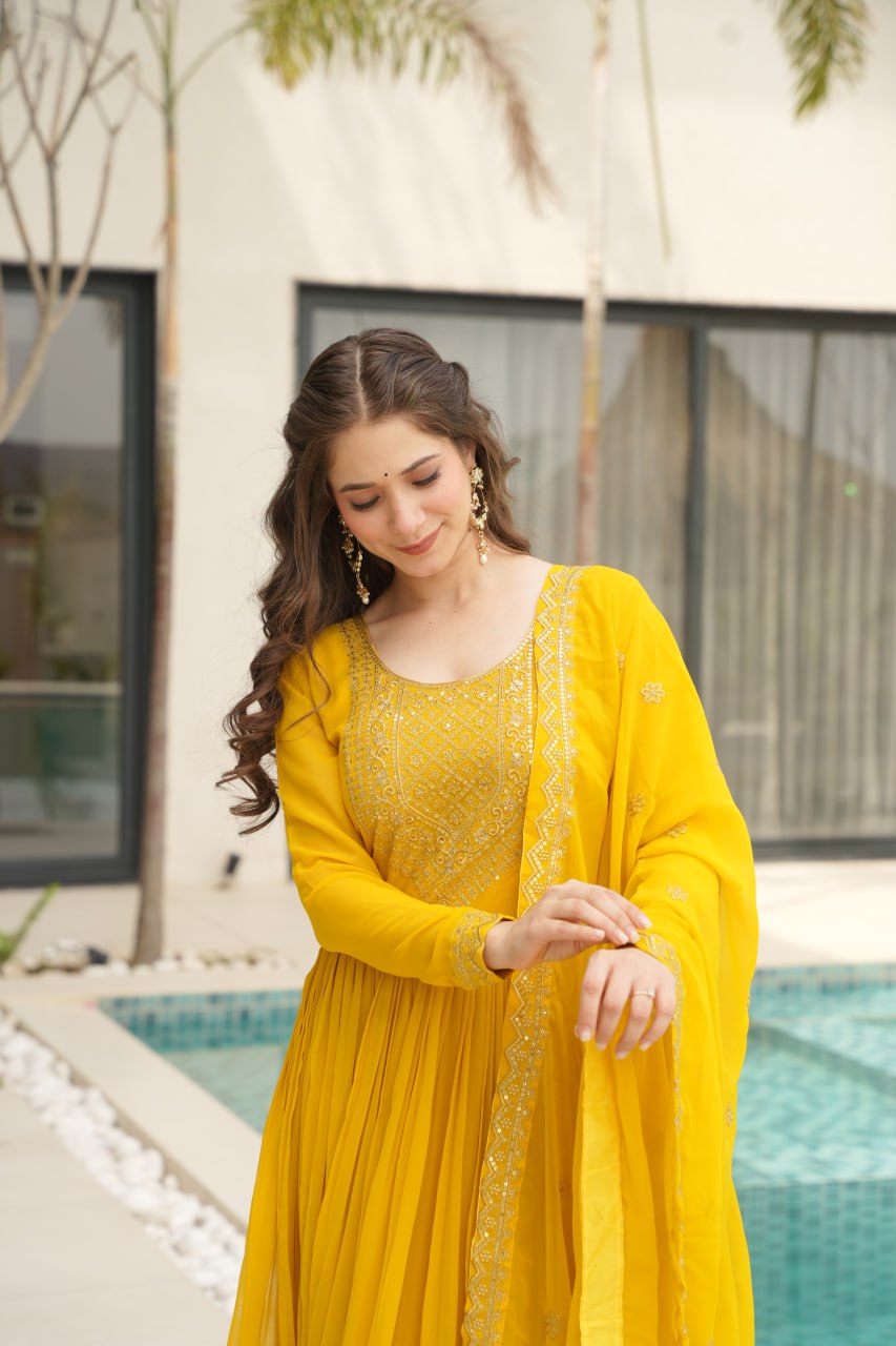 Yellow Faux Blooming With Embroidery Zari Sequins Work Gown