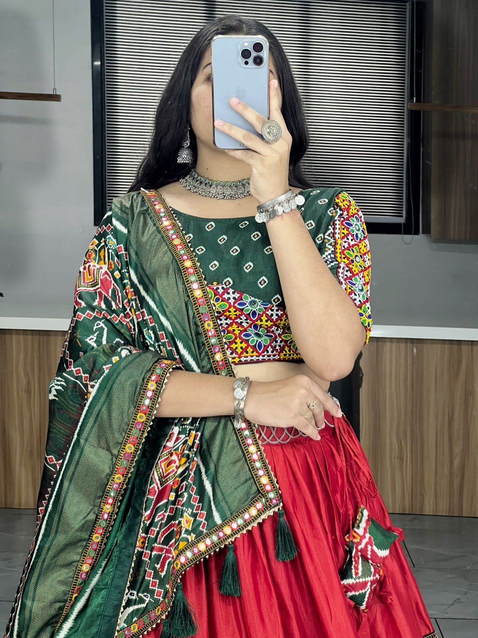 Premium garba lehenga with Gamthi mirror work and paper border
