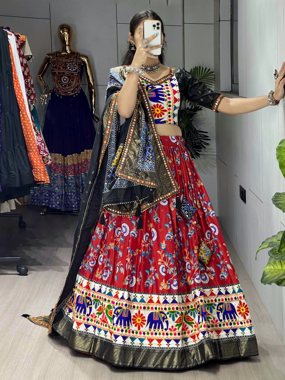 Traditional Gujarati garba lehenga with vibrant Kutchi embroidery red black
